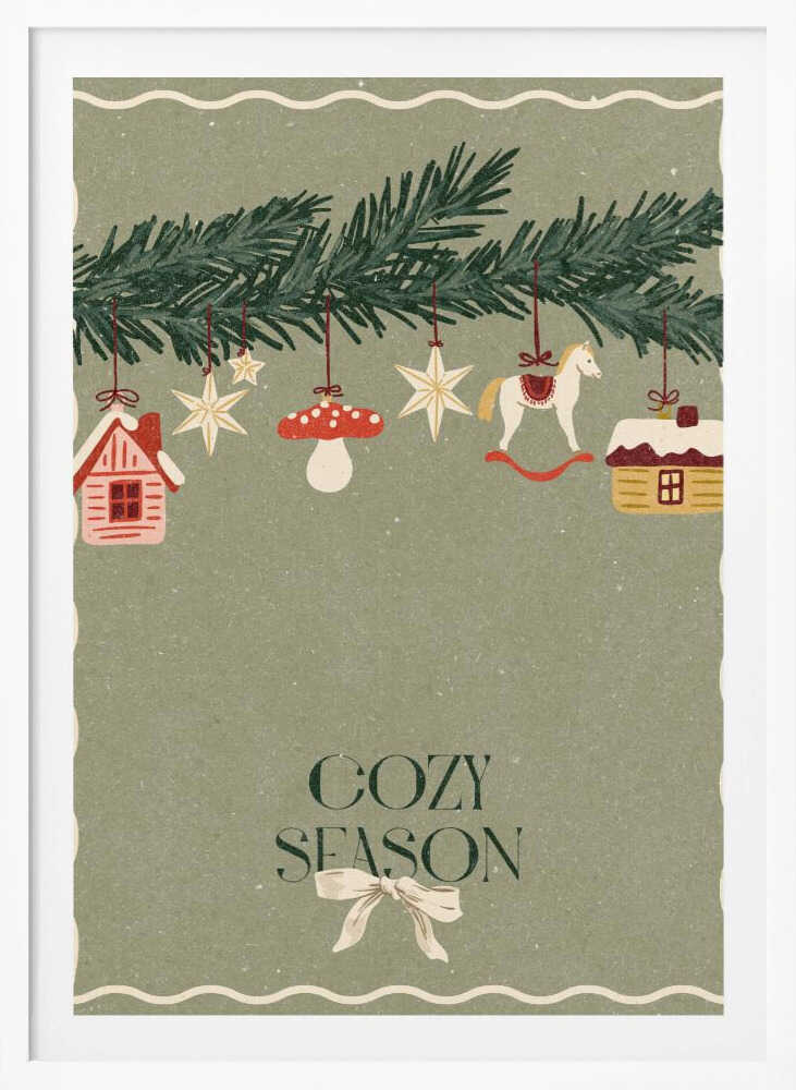 A vintage-style holiday poster with a sage green background. A pine branch hangs at the top, decorated with illustrated ornaments including houses, stars, a mushroom, and a rocking horse. Below, the text 'COZY SEASON' is written in a dark serif font with a light-colored bow underneath. Artwork