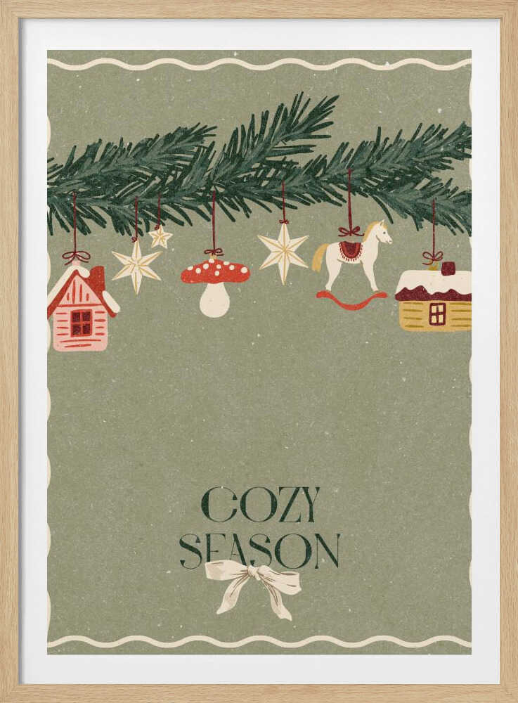 A vintage-style holiday poster with a sage green background. A pine branch hangs at the top, decorated with illustrated ornaments including houses, stars, a mushroom, and a rocking horse. Below, the text 'COZY SEASON' is written in a dark serif font with a light-colored bow underneath. Artwork