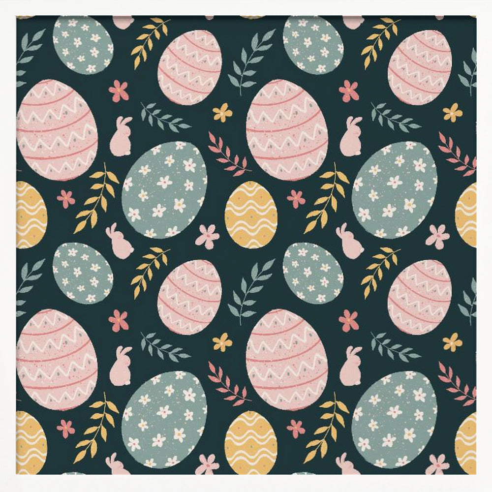 A framed piece of art with a repeating Easter pattern on a dark teal background. The pattern features decorated eggs in pink, light blue, and yellow, alongside small pink bunny silhouettes and colorful sprigs of leaves and flowers. Poster