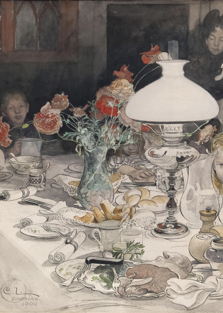 A vintage watercolor painting by C.L. Sundborn from 1900, depicting an intimate family dinner scene. A large, white oil lamp provides a warm glow over a cluttered dining table set with dishes, bread, and a vase of red poppies. Figures of children are partially visible around the table, their faces illuminated against a dark background. Print