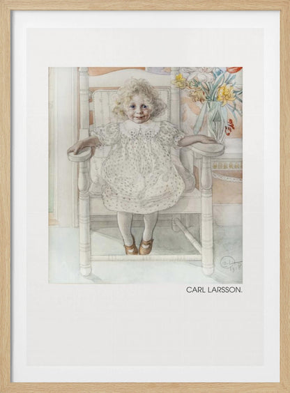 A framed art print of a watercolor painting by Carl Larsson. The piece features a young, blonde, curly-haired girl with blue eyes sitting in a white wooden chair. She wears a white dotted dress with a lace collar and smiles sweetly. Next to her is a vase of yellow, white, and red flowers. The overall aesthetic is soft, light, and classic. Decor