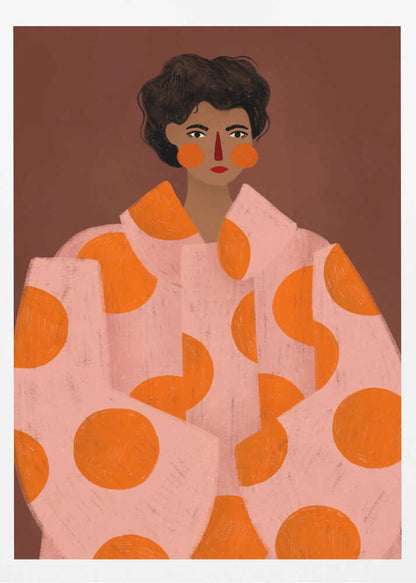 A stylized portrait illustration of a person with dark curly hair and warm brown skin against a solid reddish-brown background. They wear a light pink, oversized coat with large orange polka dots, and look directly forward with a neutral expression, accented by red lipstick and circular orange blush. Decor