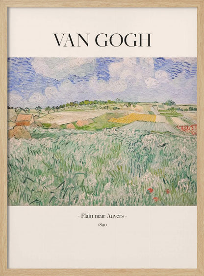 A framed art poster of Vincent van Gogh's painting, 'Plain near Auvers' from 1890. The impressionist landscape shows a vast green field in the foreground, with patchwork fields in the distance under a blue and white cloudy sky. The artist's name is printed in black serif font at the top, with the title and year at the bottom, all on a cream-colored background. Wall Art