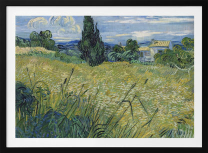Vincent van Gogh's painting 'Green Wheat Field with Cypress' in a silver frame. The artwork features a vibrant golden-yellow field with green stalks in the foreground, a towering dark green cypress tree at the center, and a small farmhouse in the background under a blue sky with stylized, swirling white clouds. The entire scene is rendered in the artist's characteristic thick, expressive brushstrokes. Print