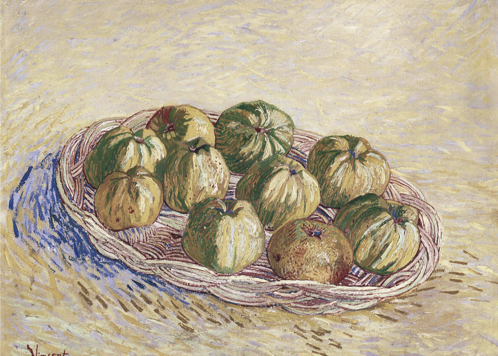 A post-impressionist still life painting by Vincent van Gogh showing a woven basket full of green and yellow apples. The background is a textured pale yellow, and the artist's signature is visible in the bottom left. The artwork is presented in a silver frame. Poster