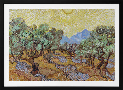 A framed Post-Impressionist painting by Vincent van Gogh depicting an olive grove under a bright yellow sun and sky. The olive trees have gnarled brown trunks and green leaves, set against a rolling landscape of ochre and lavender shadows. In the distance, blue mountains rise against the vibrant sky. The entire scene is painted with thick, energetic brushstrokes. Decor