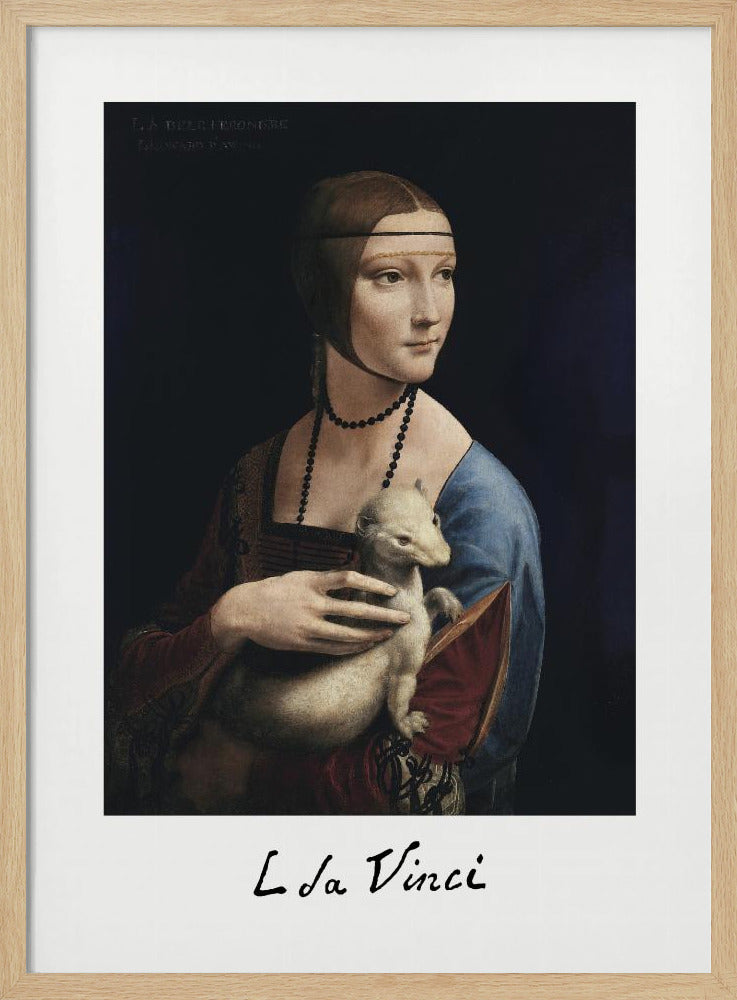 A framed art print of Leonardo da Vinci's painting, 'Lady with an Ermine'. The Renaissance portrait shows a woman holding a white ermine. The print has a white border with 'L da Vinci' signed at the bottom, mimicking a polaroid. Artwork