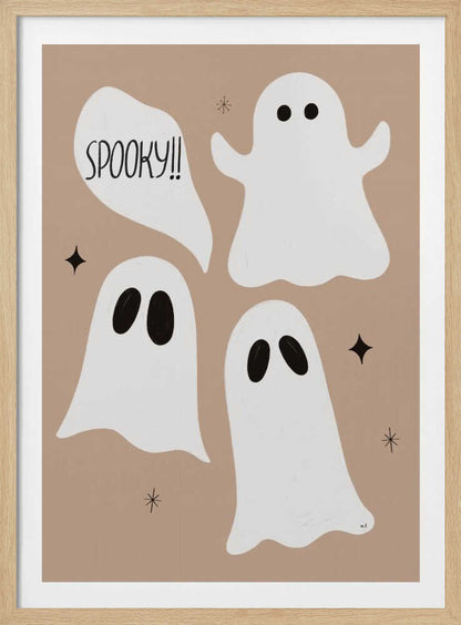 A playful illustration for Halloween featuring three cute, cartoonish white ghosts with black eyes against a solid light brown background. One ghost is accompanied by a speech bubble that reads 'SPOOKY!!' in a hand-drawn font. Small black stars and asterisks are scattered around the ghosts. The artwork is enclosed in a thin black frame. Decor