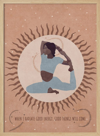 An illustration of a woman in a light blue outfit holding a King Pigeon yoga pose. She is centered within a large, pale circle representing the sun, which has wavy brown rays. The background is a dusty rose color with white specks, and a quote at the bottom reads, 'When I radiate good energy, good things will come.' Decor