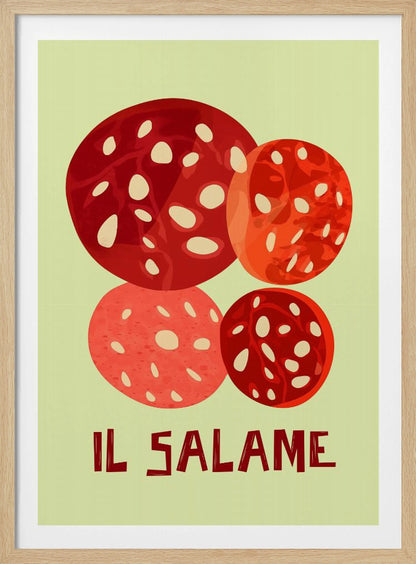 A vintage-style graphic art print of four overlapping slices of salami against a pale green background. The Italian words 'IL SALAME' are printed below in a dark, stylized font. The artwork is enclosed in a black frame. Poster