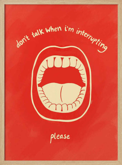 A humorous framed poster with a red background featuring a cream-colored line drawing of a large, open mouth. Above the mouth, the text reads 'don't talk when i'm interrupting' in an arch, and below it says 'please'. Print