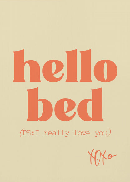 A framed art print with a cream-colored background. The words 'hello bed' are printed in a large, bold, orange serif font. Below this, in a smaller orange font, it reads '(PS: I really love you)'. In the bottom right corner, 'XOXO' is written in an orange script font. Decor
