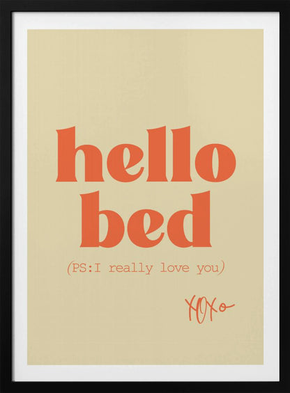 A framed art print with a cream-colored background. The words 'hello bed' are printed in a large, bold, orange serif font. Below this, in a smaller orange font, it reads '(PS: I really love you)'. In the bottom right corner, 'XOXO' is written in an orange script font. Decor