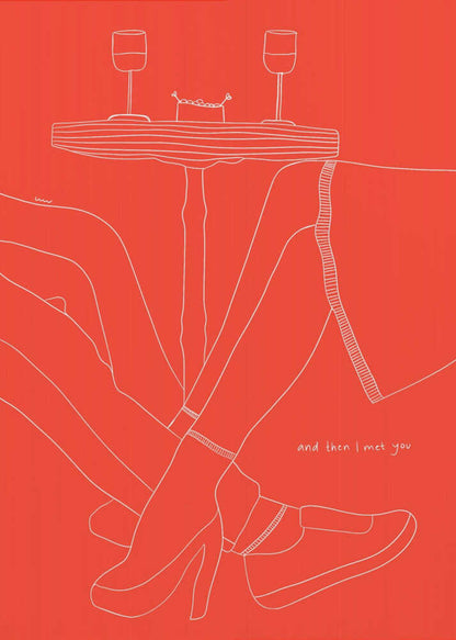 A minimalist white line drawing on a bright red background depicting a romantic date. The lower half of two figures are shown with their legs intertwined under a small table that holds two wine glasses. In the bottom right, the phrase 'and then I met you' is written in a handwritten script. Wall Art