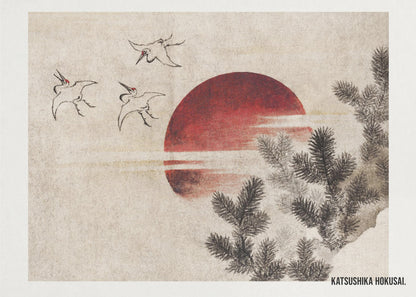 A vintage Japanese Ukiyo-e style painting by Katsushika Hokusai. The artwork features three cranes flying against a large, deep red sun on a textured beige background. In the foreground to the right, dark pine tree branches are depicted in black ink. Decor