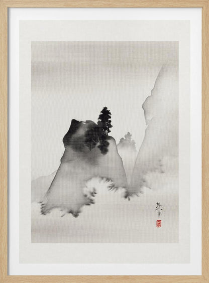 A traditional Asian ink wash painting in a black frame. The vertical artwork depicts a minimalist mountain landscape in black and grey tones on textured paper. A dark, prominent rock formation with a lone pine tree stands in the foreground, surrounded by mist, with fainter mountains in the background. A signature and a red seal are visible in the lower right corner. Artwork
