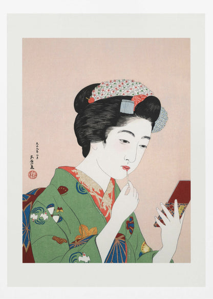 A Japanese ukiyo-e woodblock print of a woman in a green kimono applying red lipstick while looking into a small handheld mirror. Her black hair is elaborately styled, and the background is a soft pink. Artwork