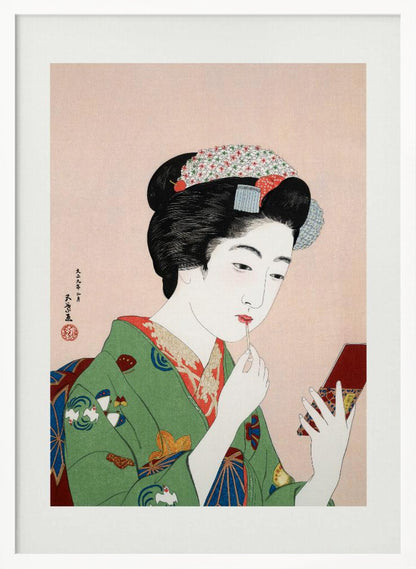 A Japanese ukiyo-e woodblock print of a woman in a green kimono applying red lipstick while looking into a small handheld mirror. Her black hair is elaborately styled, and the background is a soft pink. Artwork