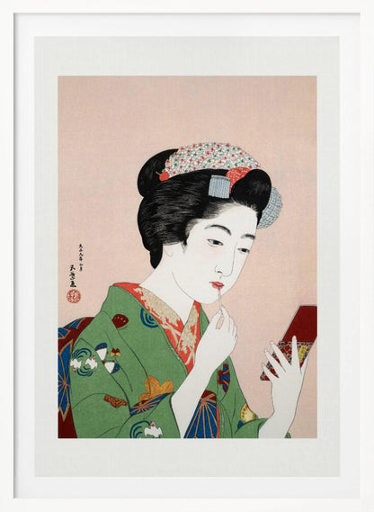 A Japanese ukiyo-e woodblock print of a woman in a green kimono applying red lipstick while looking into a small handheld mirror. Her black hair is elaborately styled, and the background is a soft pink. Artwork