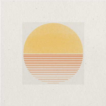 A framed minimalist art print featuring a large circle against an off-white background. The top half of the circle is a solid textured yellow, while the bottom half consists of horizontal orange stripes that gradually become thinner towards the bottom, evoking a stylized sun or sunset. The artwork is surrounded by a wide white mat and a light wood frame. Decor