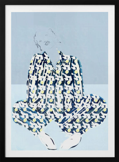 A framed fashion illustration of a person sitting cross-legged against a light blue background. The figure wears a bold, patterned blue, white, and yellow outfit, while their face and hair are rendered as faint, delicate line drawings. Wall Art