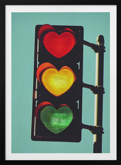 A vertical traffic light against a solid teal sky, with its red, yellow, and green signals all shaped like glowing hearts. Wall Art