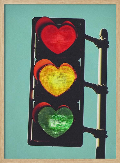 A vertical traffic light against a solid teal sky, with its red, yellow, and green signals all shaped like glowing hearts. Wall Art