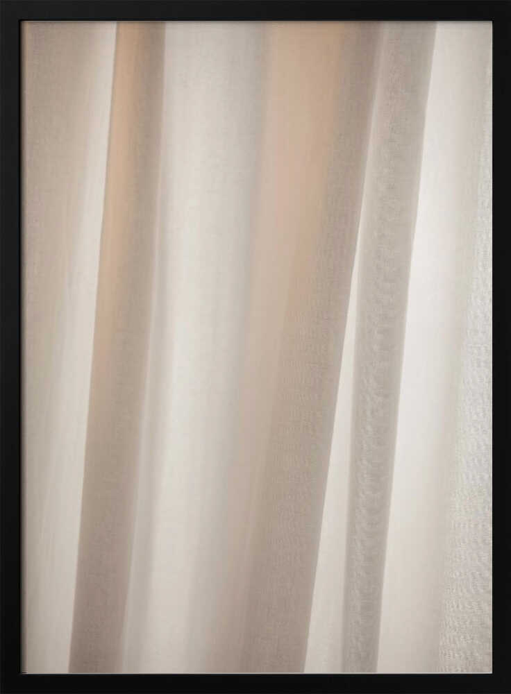 Abstract photo of light beige fabric with soft, flowing folds creating gentle shadows.