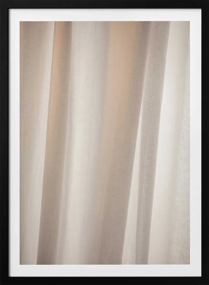 Abstract photo of light beige fabric with soft, flowing folds creating gentle shadows.