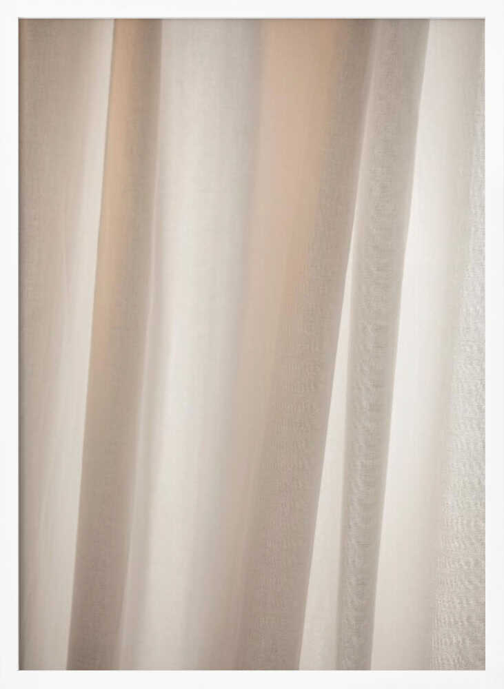 Abstract photo of light beige fabric with soft, flowing folds creating gentle shadows.