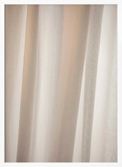 Abstract photo of light beige fabric with soft, flowing folds creating gentle shadows.