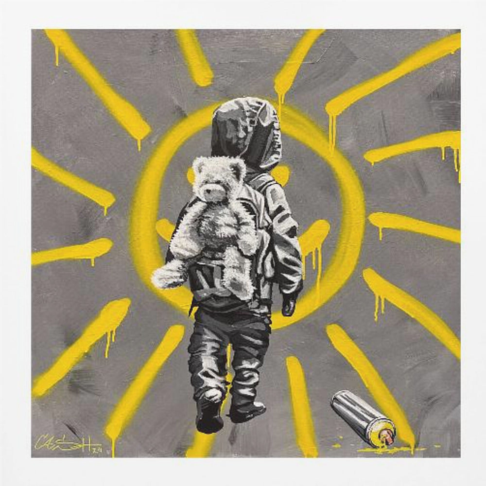A framed street art-style painting with a grey background. A large, yellow, spray-painted sun with dripping rays dominates the scene. In the foreground, a small child in a dark hoodie and pants is depicted from behind in black and white, carrying a fluffy teddy bear on their back. A discarded spray paint can lies on the ground in the bottom right corner. Poster