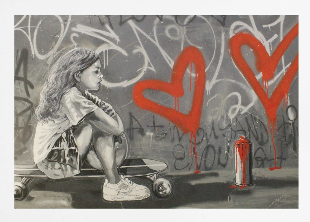 A monochrome street art painting of a young girl with long hair sitting thoughtfully on a skateboard. Behind her, a grey wall is covered in graffiti tags and two large, bright red hearts are spray-painted with drips running down. A red and white spray paint can sits on the ground next to her. Artwork