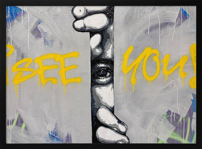 A framed modern art piece depicting a black and white eye peeking through a narrow vertical opening, with hands gripping the sides. The background is a textured gray with vibrant yellow graffiti-style text that reads 'I SEE YOU!' with paint drips. Print