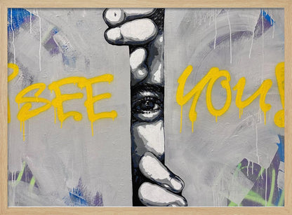 A framed modern art piece depicting a black and white eye peeking through a narrow vertical opening, with hands gripping the sides. The background is a textured gray with vibrant yellow graffiti-style text that reads 'I SEE YOU!' with paint drips. Print