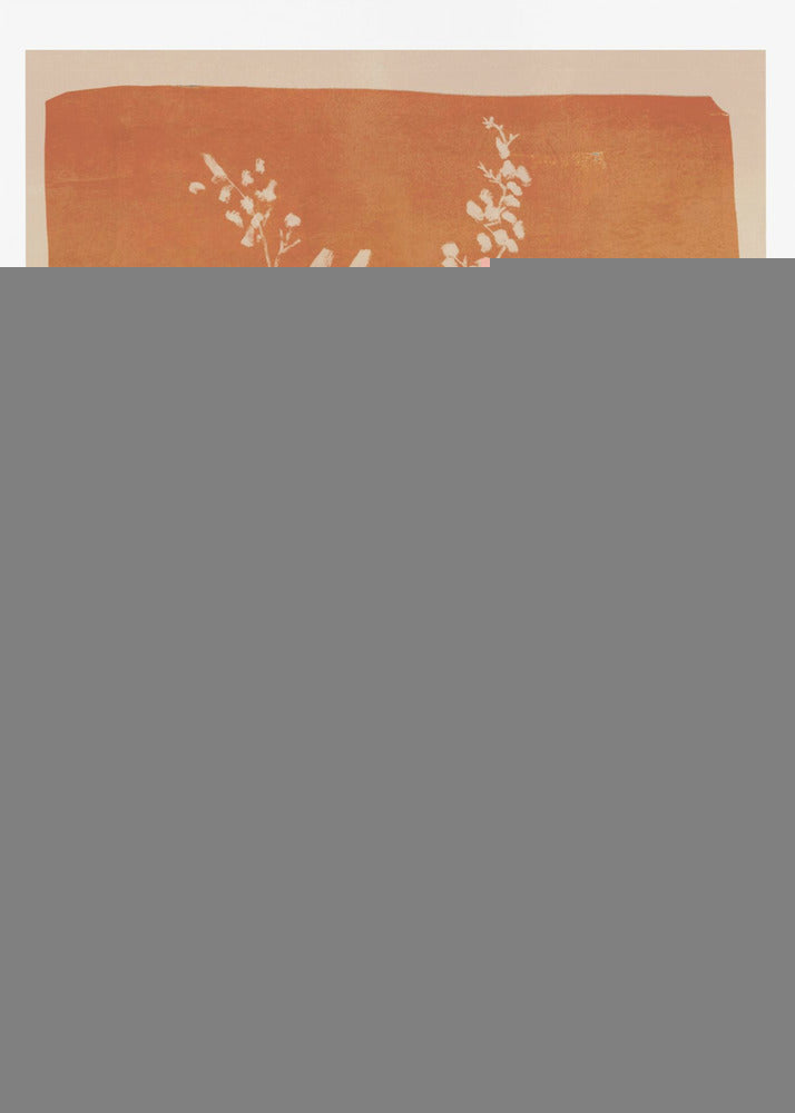 A botanical block print style illustration of a plant with large, pointed leaves and delicate flowering sprigs. The plant is rendered in a creamy off-white against a textured, burnt orange background. The artwork is presented in a simple black frame. Print