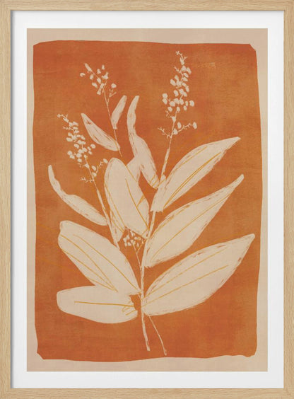 A botanical block print style illustration of a plant with large, pointed leaves and delicate flowering sprigs. The plant is rendered in a creamy off-white against a textured, burnt orange background. The artwork is presented in a simple black frame. Print