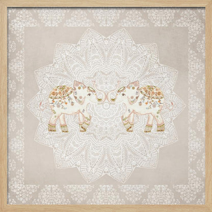 A framed artwork depicting two small, ornate elephants facing each other in the center, their trunks touching. They are decorated with colorful floral patterns and stand against a large, intricate white mandala on a light beige background. The piece is bordered with a white pattern and set in a light wood frame. Wall Art