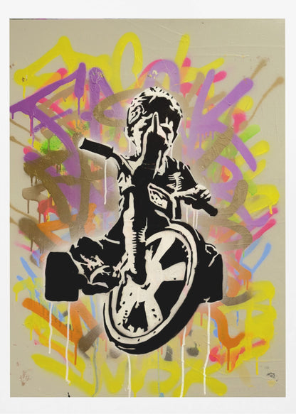 A framed street art piece featuring a black and white stencil of a rebellious child on a tricycle giving the middle finger, set against a vibrant, multi-colored graffiti background with paint drips. Artwork