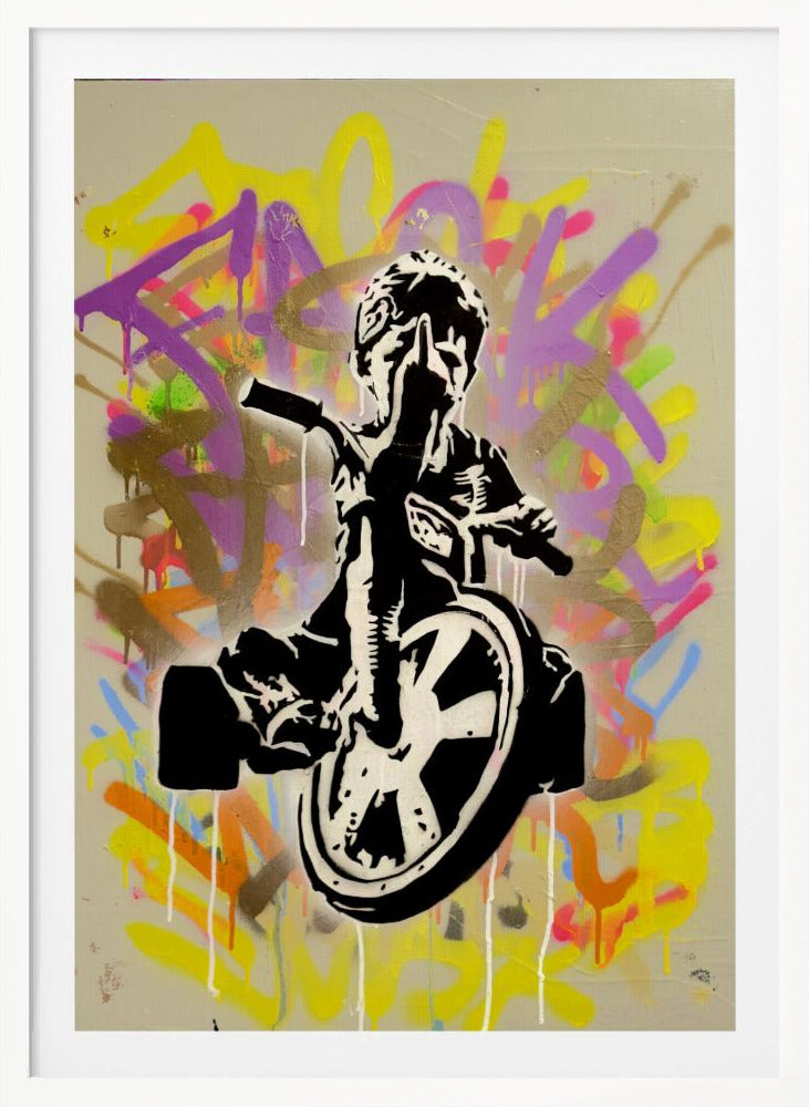 A framed street art piece featuring a black and white stencil of a rebellious child on a tricycle giving the middle finger, set against a vibrant, multi-colored graffiti background with paint drips. Artwork
