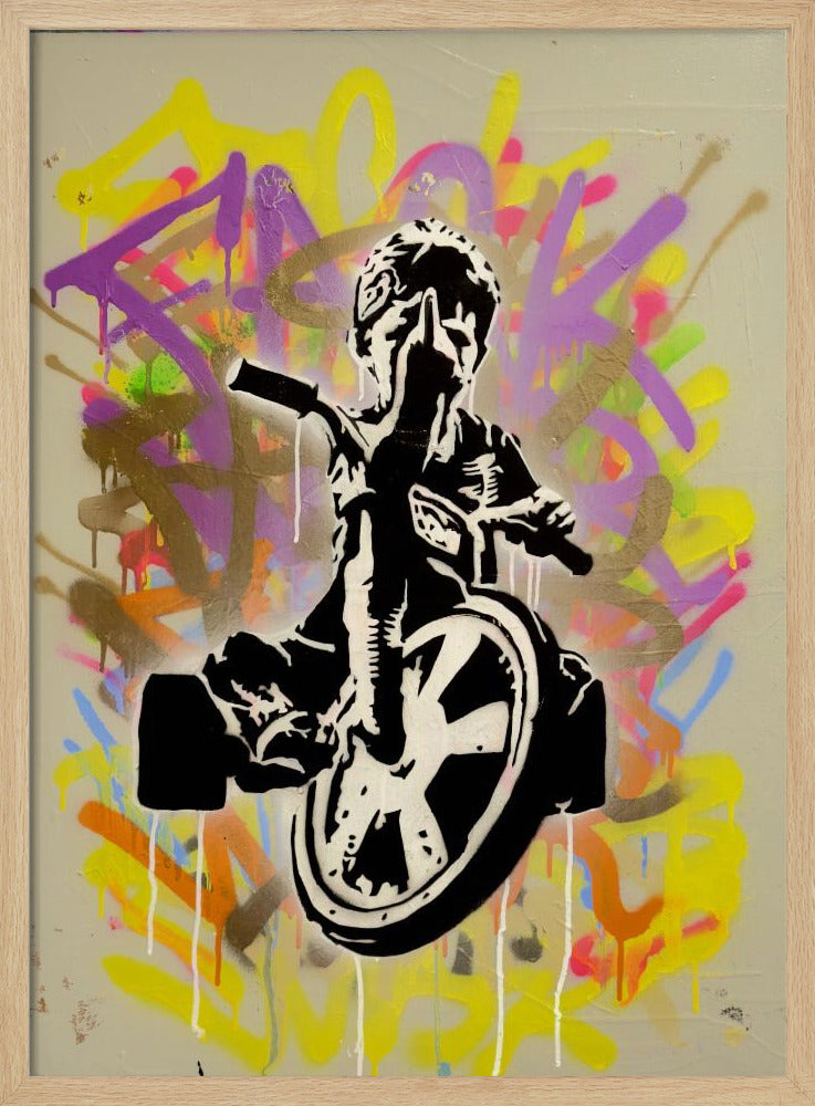 A framed street art piece featuring a black and white stencil of a rebellious child on a tricycle giving the middle finger, set against a vibrant, multi-colored graffiti background with paint drips. Artwork