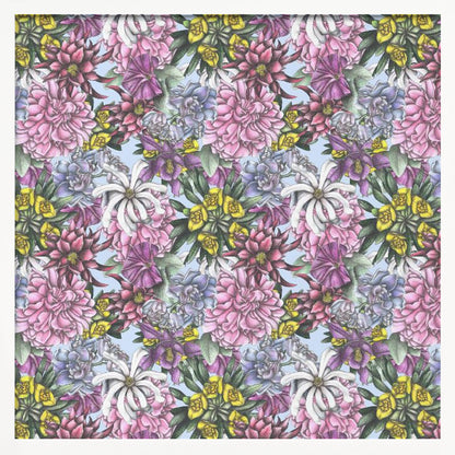 A framed artwork displaying a dense, repeating floral pattern with detailed illustrations of pink, purple, blue, white, and yellow flowers on a light blue background, encased in a simple light wood frame. Decor
