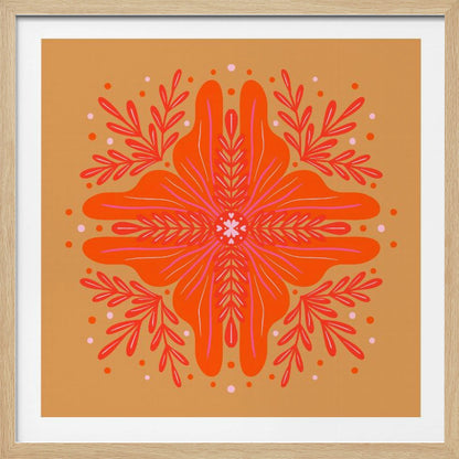 A square, framed artwork featuring a symmetrical, abstract floral design in the style of a mandala. The central element is a vibrant orange flower with intricate pink and red details, set against a warm, mustard-orange background. The design is surrounded by red leafy branches and decorative dots. Decor