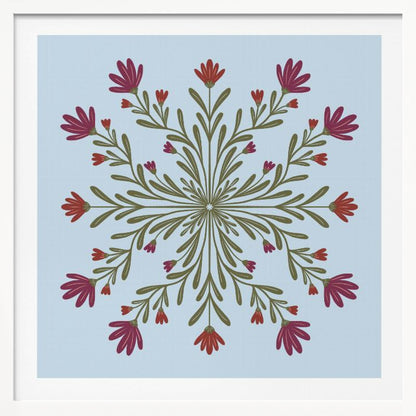 A framed art print with a symmetrical floral mandala on a light blue background. Olive green stems and leaves radiate from the center, blooming with magenta and red flowers. The artwork is enclosed in a light wood frame. Wall Art