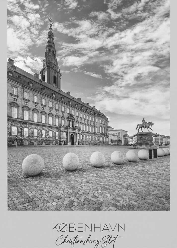 A black and white travel poster of Christiansborg Palace in Copenhagen, Denmark. The image shows the grand building and its tower against a dramatic cloudy sky, with a cobblestone square, stone bollards, and an equestrian statue in the foreground. Text at the bottom identifies the location. Decor