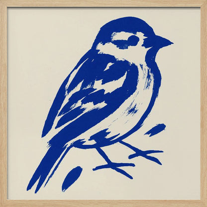 A stylized art print of a small bird, possibly a sparrow, rendered in bold cobalt blue ink with expressive brushstrokes. The bird is set against a solid cream background and enclosed in a light wood frame. Print