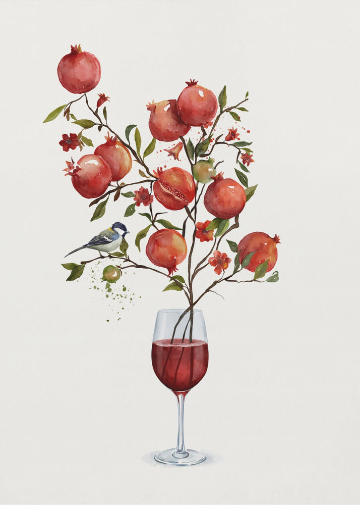 A surreal watercolor painting of a pomegranate branch growing out of a glass of red wine. The branch is laden with ripe red pomegranates, small red blossoms, and green leaves. A small blue and white bird is perched on a twig. The background is a clean, solid white, and the entire image is framed in black. Wall Art