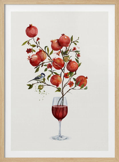 A surreal watercolor painting of a pomegranate branch growing out of a glass of red wine. The branch is laden with ripe red pomegranates, small red blossoms, and green leaves. A small blue and white bird is perched on a twig. The background is a clean, solid white, and the entire image is framed in black. Wall Art