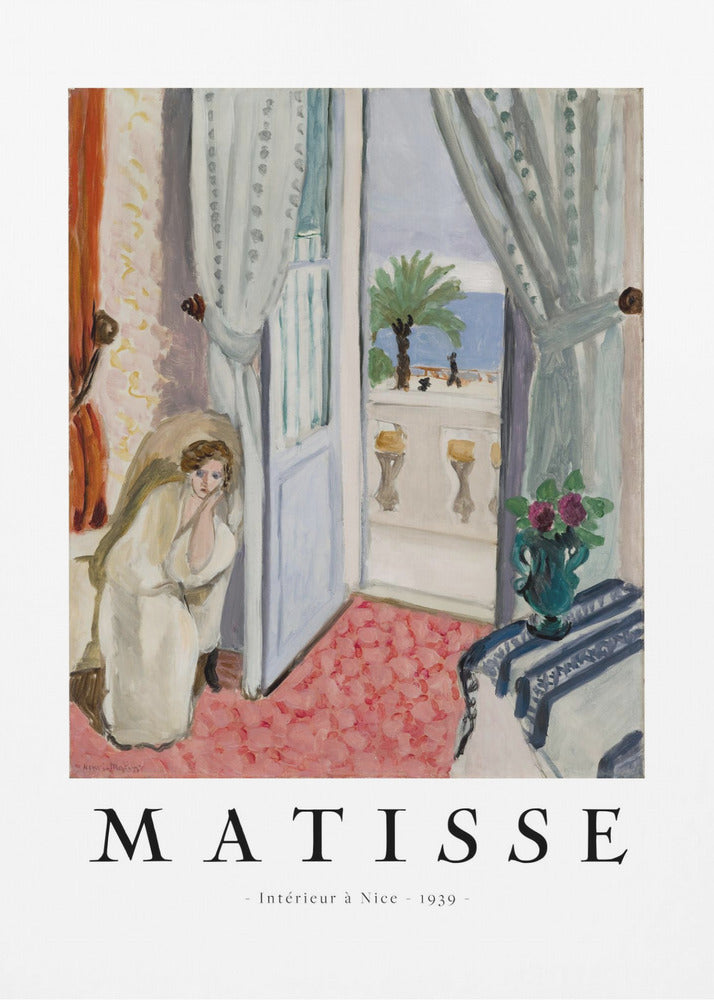 A framed art print of Henri Matisse's painting 'Intérieur à Nice - 1939'. The painting depicts a woman in a white robe sitting in a sunlit room with an open door leading to a balcony overlooking the sea and a palm tree. The poster has a white border with the artist's name and the title below the artwork. Artwork