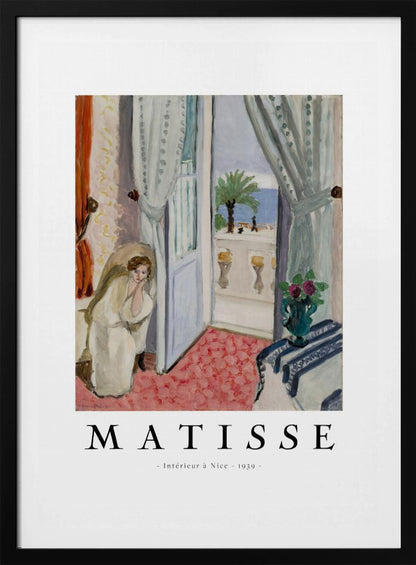 A framed art print of Henri Matisse's painting 'Intérieur à Nice - 1939'. The painting depicts a woman in a white robe sitting in a sunlit room with an open door leading to a balcony overlooking the sea and a palm tree. The poster has a white border with the artist's name and the title below the artwork. Artwork